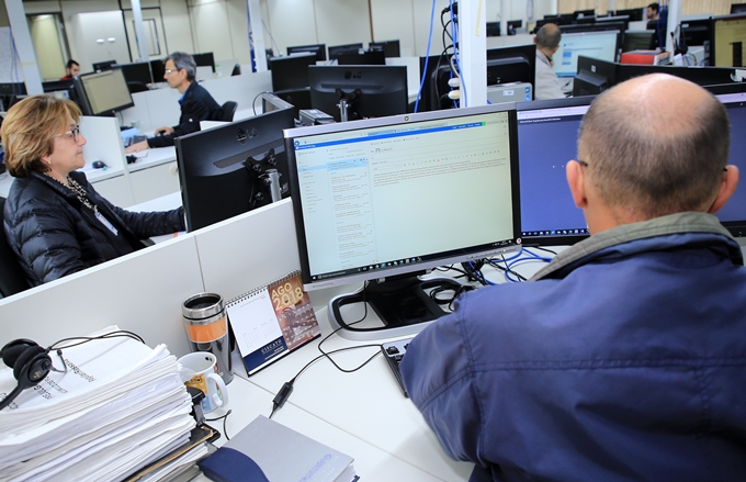 Trabalho na Coordenadoria de Gestão Municipal (CGM), unidade técnica do TCE-PR dedicada à instrução dos processos dos jurisdicionados da esfera municipal. Foto: Wagner Araújo/Divulgação TCE-PR