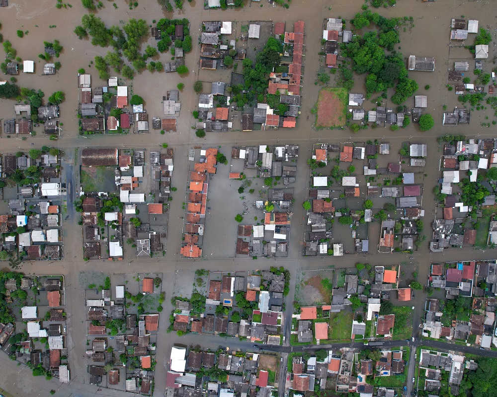 Vista aérea de parte da cidade de União da Vitória (Região Sul) alagada pelo Rio Iguaçu, devido às chuvas que atingiram o Paraná em meados de outubro de 2023. Foto: Gilson Abreu/Agência Estadual de Notícias
